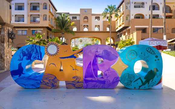 Cabo San Lucas, Los Cabos, Mexico, 2 October, 2021: Los Cabos colorful letters in Cabo San Lucas marina a departure point for cruises, marlin fishing and lancha boats to El Arco Arch and beaches