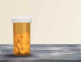 Concept of antiviral pill against coronavirus disease. COVID drugs on a medical table.