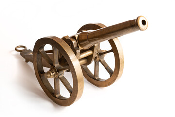 A modern serial specially aged souvenir brass replica of a cannon modeled on a real military cannon during the US Civil War on a white background