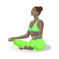 african-american, dark skin yoga girl in green sitting in lotus pose