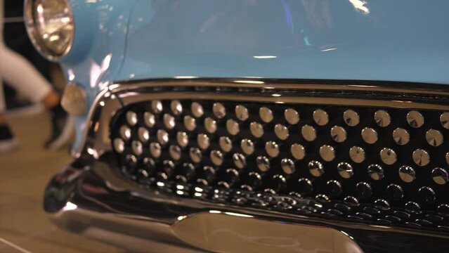 This video shows a panning of a light blue and chrome kustom 1950s Buick car grill.