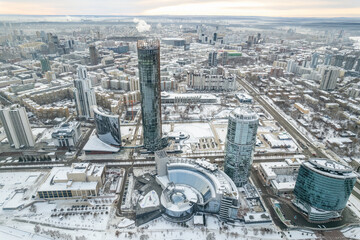 Yekaterinburg aerial panoramic view in Winter at sunset. Yekaterinburg city and pond in winter.