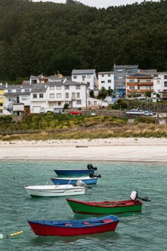 boats on the shore of the beach