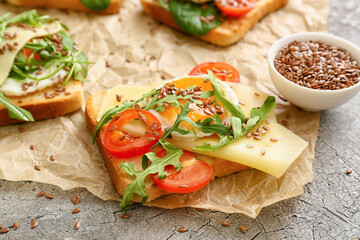 Tasty toasts on grunge background