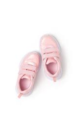 Pink sports shoes, sneakers isolated on white background. Top view Flat lay