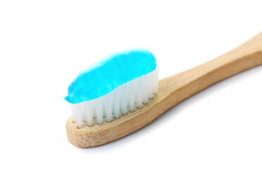 Tooth brush and paste on white background, closeup