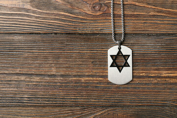 Military tag of Israeli soldier on wooden background