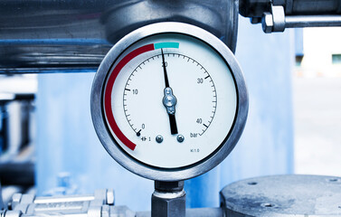 Close up gas pressure meter tubes valves
