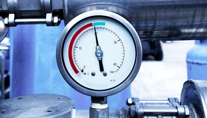 Close up gas pressure meter tubes valves