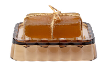 Soap bar on soap dish isolated on white