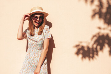 Young beautiful smiling hipster woman in trendy summer clothes. Sexy carefree woman posing in the...