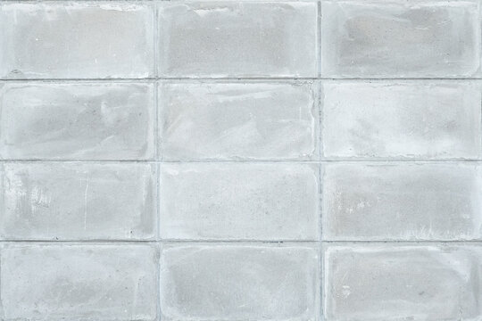 Closeup of grey block wall, Concrete block wall seamless background and texture