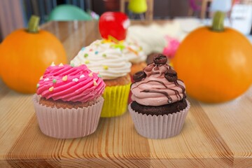 Muffins with pumpkin. Delicious homemade dessert. Halloween treats. Vegetarian dish.