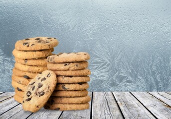 Peanut butter cookies stack on wooden board. Traditional american dessert, nutrition snack, dessert or breakfast food.