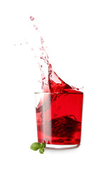 Glass of tasty pomegranate juice with splashes on white background