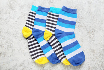 Striped socks on light background