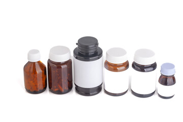 bottles with medicine with white label