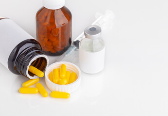 medicine bottle and pills