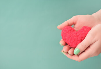hands holding red heart, health care, love, organ donation, world heart day, world health day,...