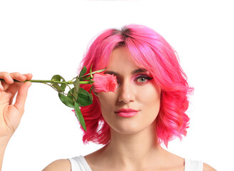 Stylish woman with bright hair and rose flower on white background