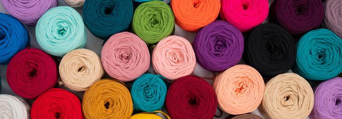 Close-up of multi-colored cotton skeins. Shop assortment for handmade