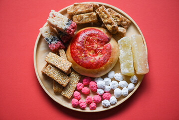Chinese desserts chinese pastry bean cake, Snack mix nuts candies sweets sugar nuts sesame seeds coated beans puffed rice candied, Thai and chinese pay respect to god in chinese new year festival