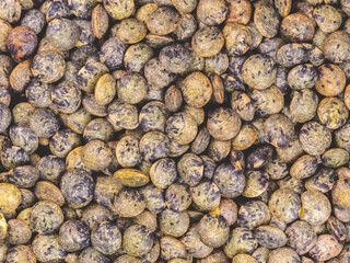 Green lentils seen from above - bio and vegan food - texture background