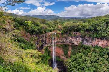 Fototapeta na wymiar Chamarel Waterfalls in the jungle in tropical island of Mauritius. 