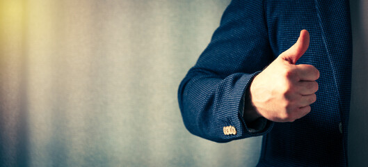 businessman holds his finger up, the concept of the right decision, close-up