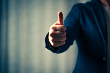 businessman holds his finger up, the concept of the right decision, close-up