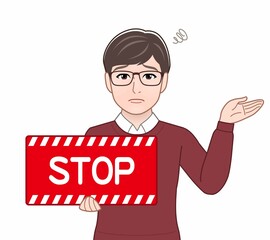 ストップのパネルを持っている男性