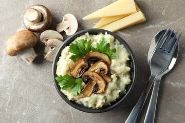 Concept of tasty food with risotto with mushrooms, top view