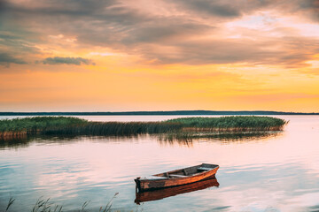 Braslaw Or Braslau, Vitebsk Voblast, Belarus. Wooden Rowing Fishing Boat In Beautiful Summer Sunset...