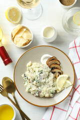 Concept of tasty food with risotto with mushrooms, top view