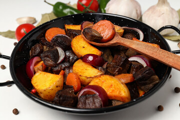 Concept of tasty food with beef with vegetables, close up
