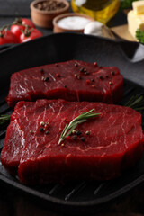 Concept of tasty food with raw beef steaks, close up