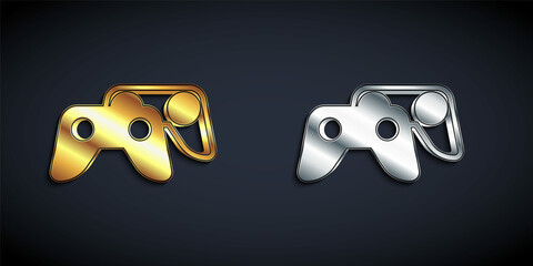 Gold and silver Game controller or joystick for game console icon isolated on black background. Long shadow style. Vector
