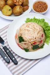 Delicious chicken aspic on a plate isolated on white background