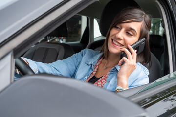 Woman use mobile phone in car