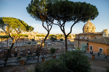 Scenic view on ruins of Roman Forum at sunset. Concept of historical landmarks and travel Italy