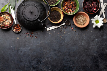 Various dried tea and teapot