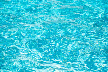 Pool water background, blue wave abstract or rippled water texture background.