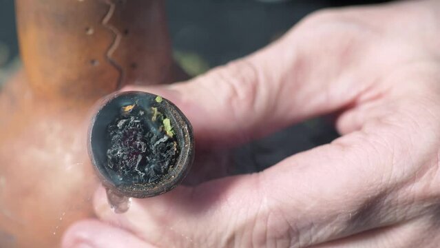 one of a series of smoking medical cannabis. smoking pipe with medical marijuana close-up. 4k
