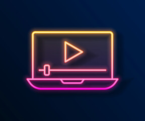 Glowing neon line Online play video icon isolated on black background. Laptop and film strip with play sign. Vector