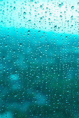 Naklejka na ściany i meble rain drops on glass