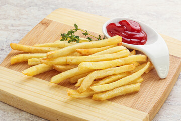 French fried potato over board