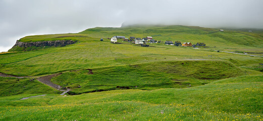 Naklejka premium View of Gasadalur village, Vagar, Faroe Islands, Kingdom of Denmark, Europe.