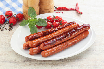Roasted sausages in the plate
