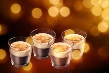 Traditional Chanukah candles with dark bokeh lights background