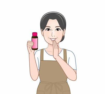 美容ドリンクをもつ女性